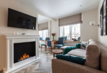 Photo of Дизайн гостиной с уютным камином